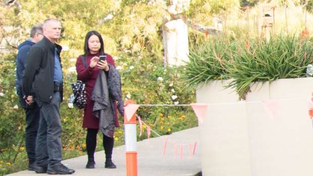 Consular official Bin Xu at the Tiananmen Square rally.