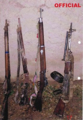 A photo tendered in evidence in Ben Roberts-Smith’s defamation case showing a series of guns, including a machine-gun on the far right and a rifle on the far left that the former soldier alleged were carried by two Afghan men killed by Australian forces.