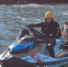 The dog was returned to safety after being swept to Snapper Island on Monday.