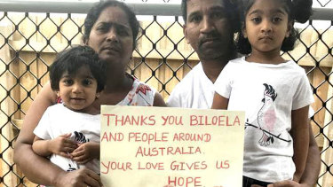Priya and Nades Murugappan and their Australian-born children, Tharnicaa and Kopika, in a photo taken during their court fight to remain in Australia.