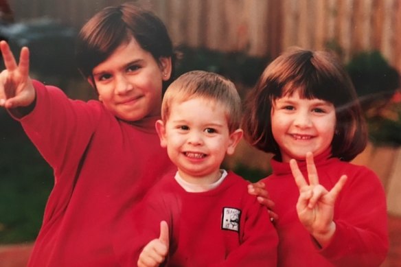 Sarah Bacaller (right) with her sister and brother. 