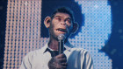 Robbie Williams is played by actor Jonno Davies as a monkey in the biopic Better Man.