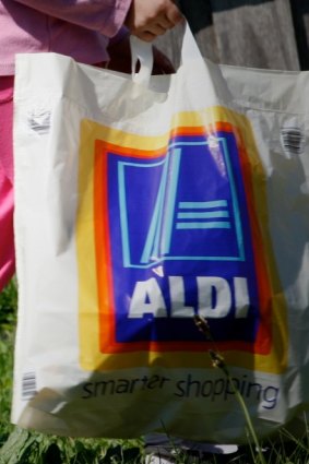 Brand Labor? The common-variety Aldi shopping bag in action.