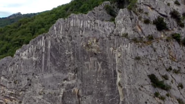 The Benito Mussolini "Dux" carving on a cliff above Villa Santa Maria, Abruzzo, Italy.