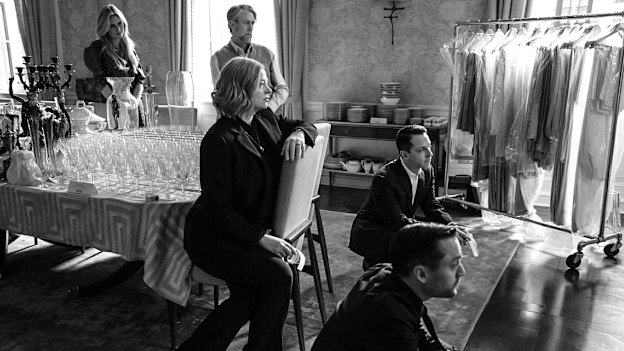 In TV show Succession, the children of the late Logan Roy pause to watch him on a video while holding rolls of stickers, each with their own colour, to divvy up his household items. 