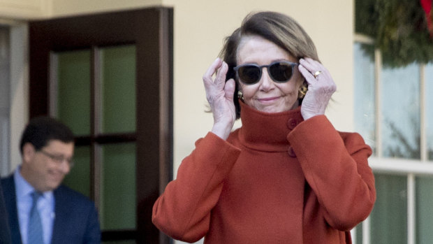 House Minority Leader Nancy Pelosi walks out of the West Wing following a meeting with President Trump on Tuesday. 
