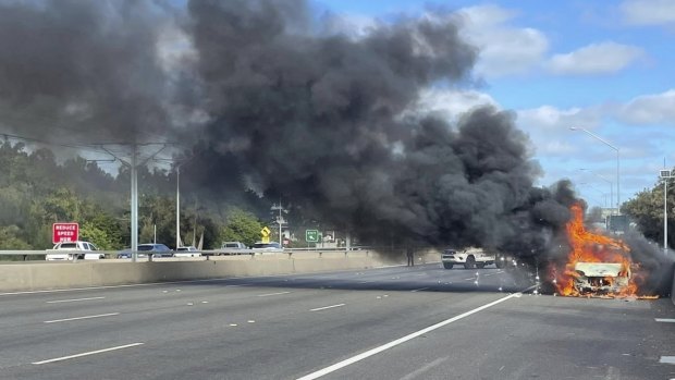 The car fire on Kwinana Freeway started about 3pm causing traffic mayhem for returning holidaymakers. 