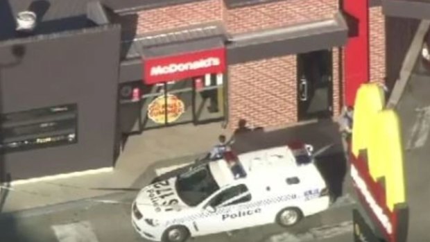 Police outside McDonald's Livingston.