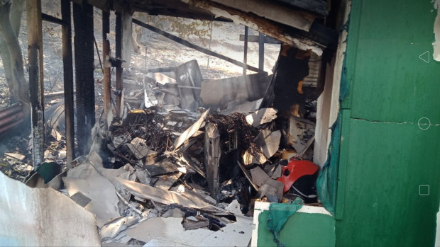 A family forced to evacuate returned home to find all their belongings destroyed in a shed fire in Queensland.
