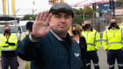 MUA Sydney secretary Paul McAleer with workers at Port Botany at the start of a four-hour stoppage on Friday.