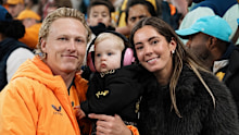 Carter Gordon and partner Abbey with their baby.