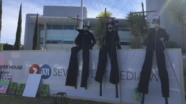 Extinction Rebellion protesters outside Seven West Media headquarters in Perth.