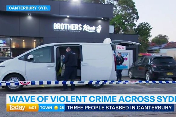 Forensic officers at the scene in Canterbury where three men were allegedly stabbed in an altercation.