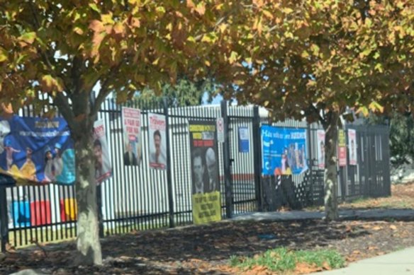 Aveley Primary School fence was left strewn with election posters. 