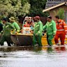 SES volunteers help residents from their flooded homes in Irymple.