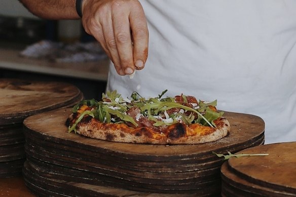 Wood-fired pizza at Trulli.