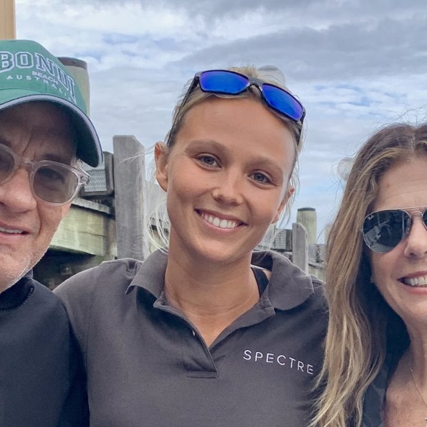 Tom Hanks and Rita Wilson with Elodie Dalgleish from Sydney Harbour Boat Tours. The Hollywood couple's COVID-19 diagnosis shut the family business down. 