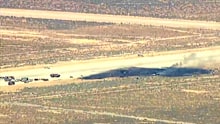This photo from KABC shows the scene of an aircraft crash, on Monday, June 15, near Edwards Air Force Base, California.