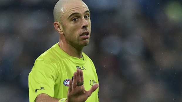 The Carlton fan booted out of the stadium for abusing an umpire has been given a warning.