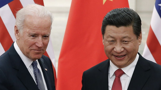 Joe Biden with Xi Jinping, pictured in 2013 when Biden was US vice-president. 