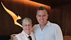 Trent Twomey outside the Brisbane Chairman’s Lounge with retiring Qantas staff member, Trudy