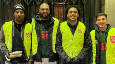 South Sydney Rabbitohs forward Davvy Moale, second from right, often delivers food to the needy.
