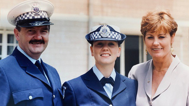 Lauren Callaway as an academy graduate with  her parents Liz and  sergeant John Callaway.