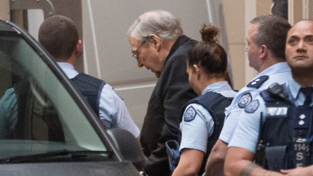 George Pell leaves court on Wednesday afternoon.