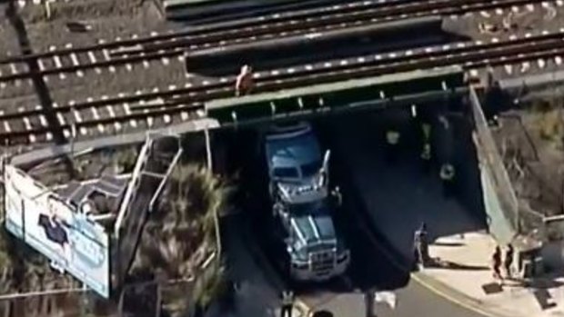 A Woolworths truck was stuck under the bridge on Tuesday morning.
