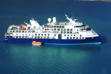 Aurora Expedition’s Ocean Explorer has run aground off the coast of Greenland and is unlikely to be moved until Friday.