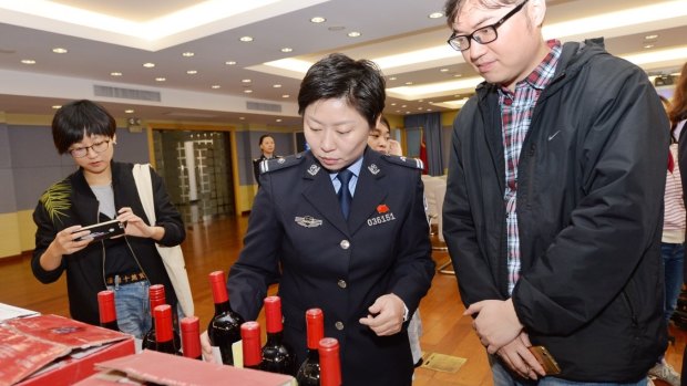 Bottles of counterfeit wine being sold on China's site, Alibaba.