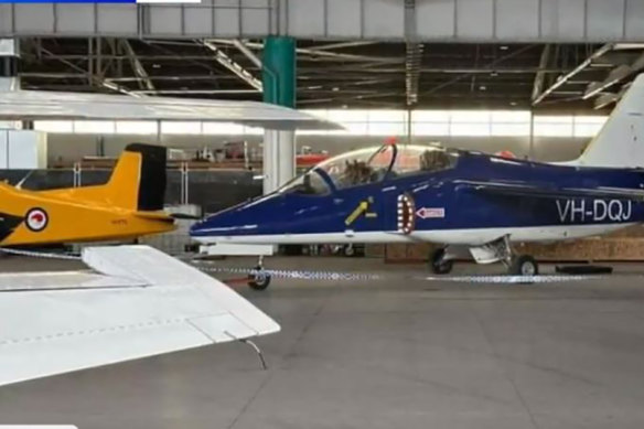 The other S211 jet in its hanger, behind police tape, in Essendon on Sunday afternoon.