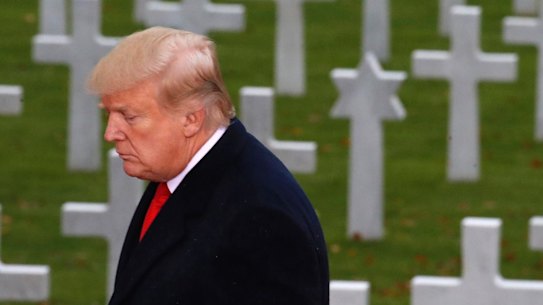White House defends Trump's cemetery no-show