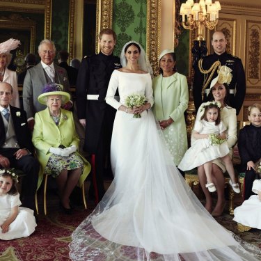 In good times and in bad: Prince Harry and Meghan, the Duchess of Sussex surrounded by family on their wedding day. 