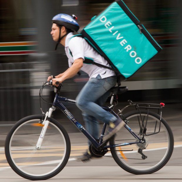 A Deliveroo rider.