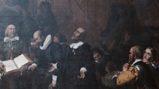 Members of the National Guard walk in the Capitol as the House of Representatives prepared to vote on impeaching President Donald Trump on Wednesday.