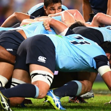 Nick Phipps of the Waratahs “feeds” a scrum.