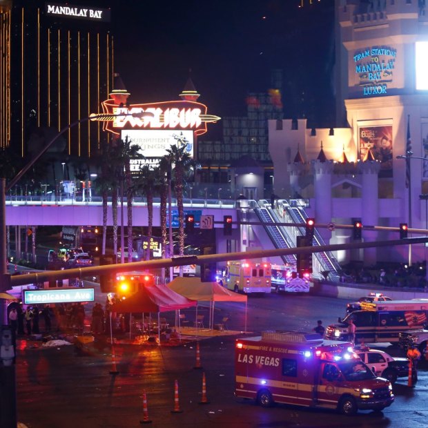 Police and medical workers block off an intersection after the mass shooting at a Las Vegas concert.