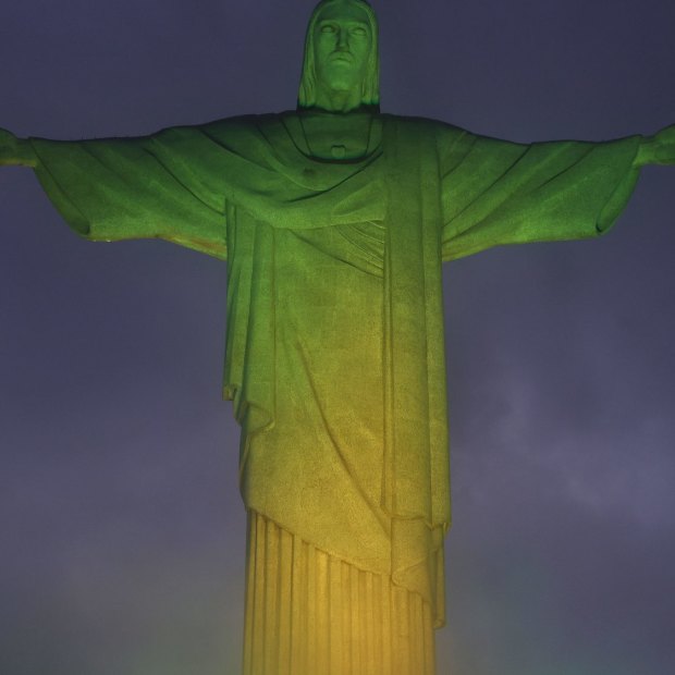 Christ the Redeemer statue is lit with the colours of the Brazilian flag to pay homage to late football legend Pele in Rio de Janeiro, Brazil.