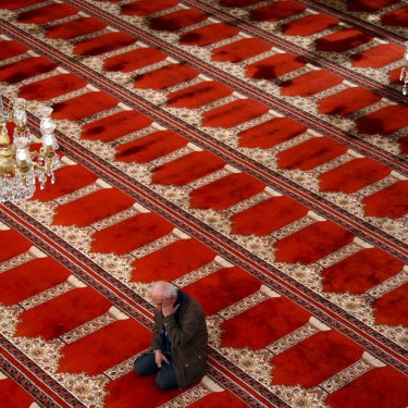 A Muslim worshipper during Ramadan in the Gallipoli Mosque in Auburn, Sydney. 