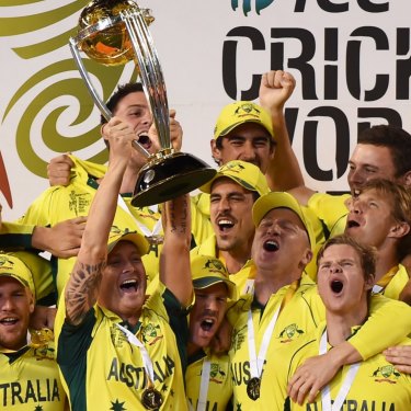 Home heroes: Michael Clarke holds up the 2015 trophy after Australia beat New Zealand in the World Cup final at the MCG