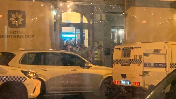 Hotel Northbridge being evacuated on Friday evening.