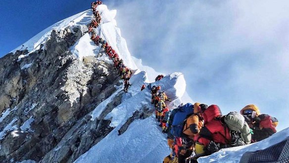 A picture by climber Nirmal Purja shows heavy traffic of mountain climbers lining up to stand at the summit of Mount Everest. 