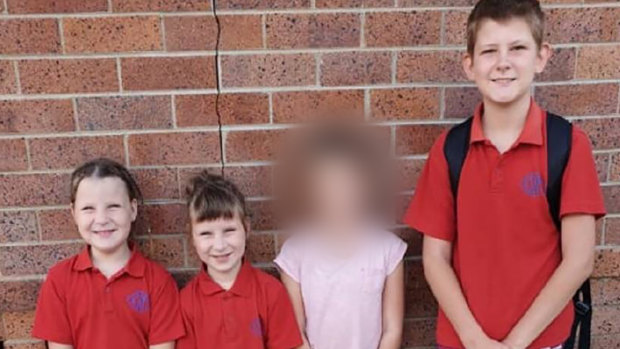 Chris and Kara Atkin's family home was devastated by fire, claiming the lives of three of their children, twins Matylda and Scarlett and brother Blake. Bayley (second from right) survived the blaze.