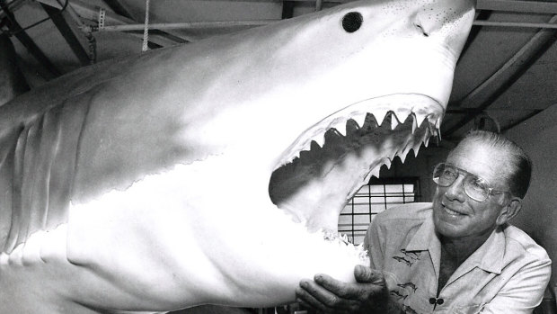 Jack Randall poses with a model of a white shark at Taronga Zoo in 1991.
