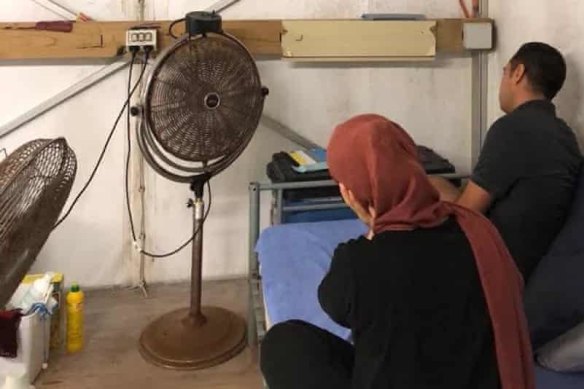 Narges Alizadeh and her brother Daryush in a mouldy tent during their time in immigration detention on Nauru.