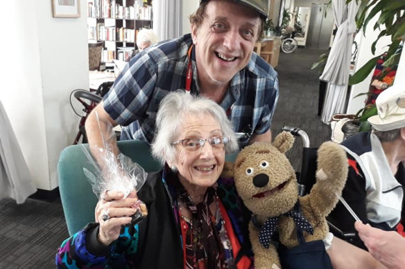 Abe Schwarz with his mum Tess at her aged care facility.