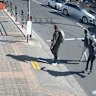 Man fighting for life, woman seriously injured after car ploughs into pedestrians