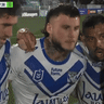 Canterbury Bulldogs players doing deep breathing during a game.