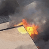 Aerial view of a fire at a Metro Petroleum service station in Fairfield, Sydney on December 9, 2025.